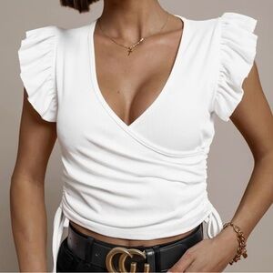 White ruffled fitted wrap-around style top
